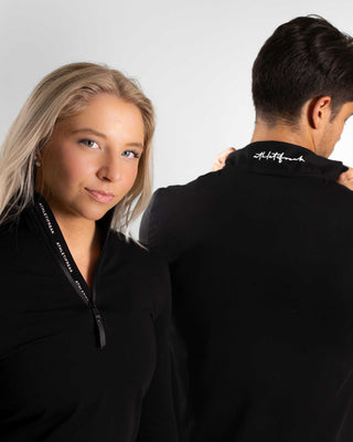 A men and women wearing Athletifreak's training half zip | Athleisure